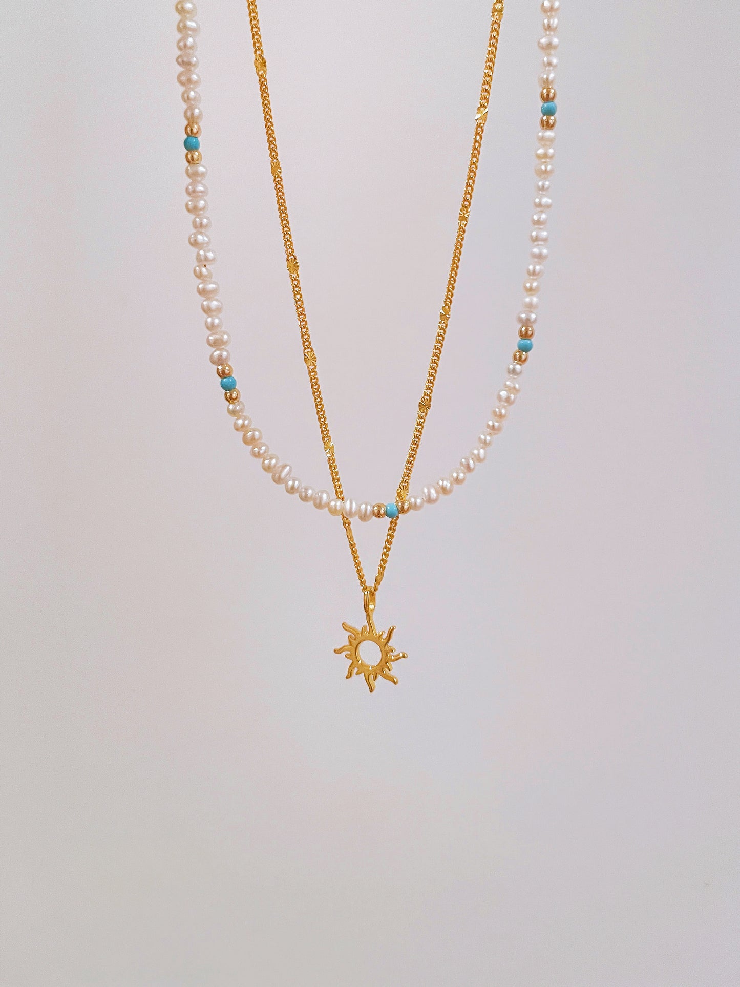 Sun pendant necklace
