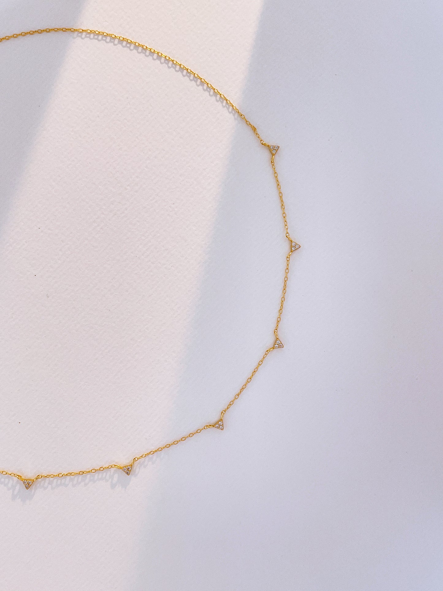 Small triangle zirconia necklace