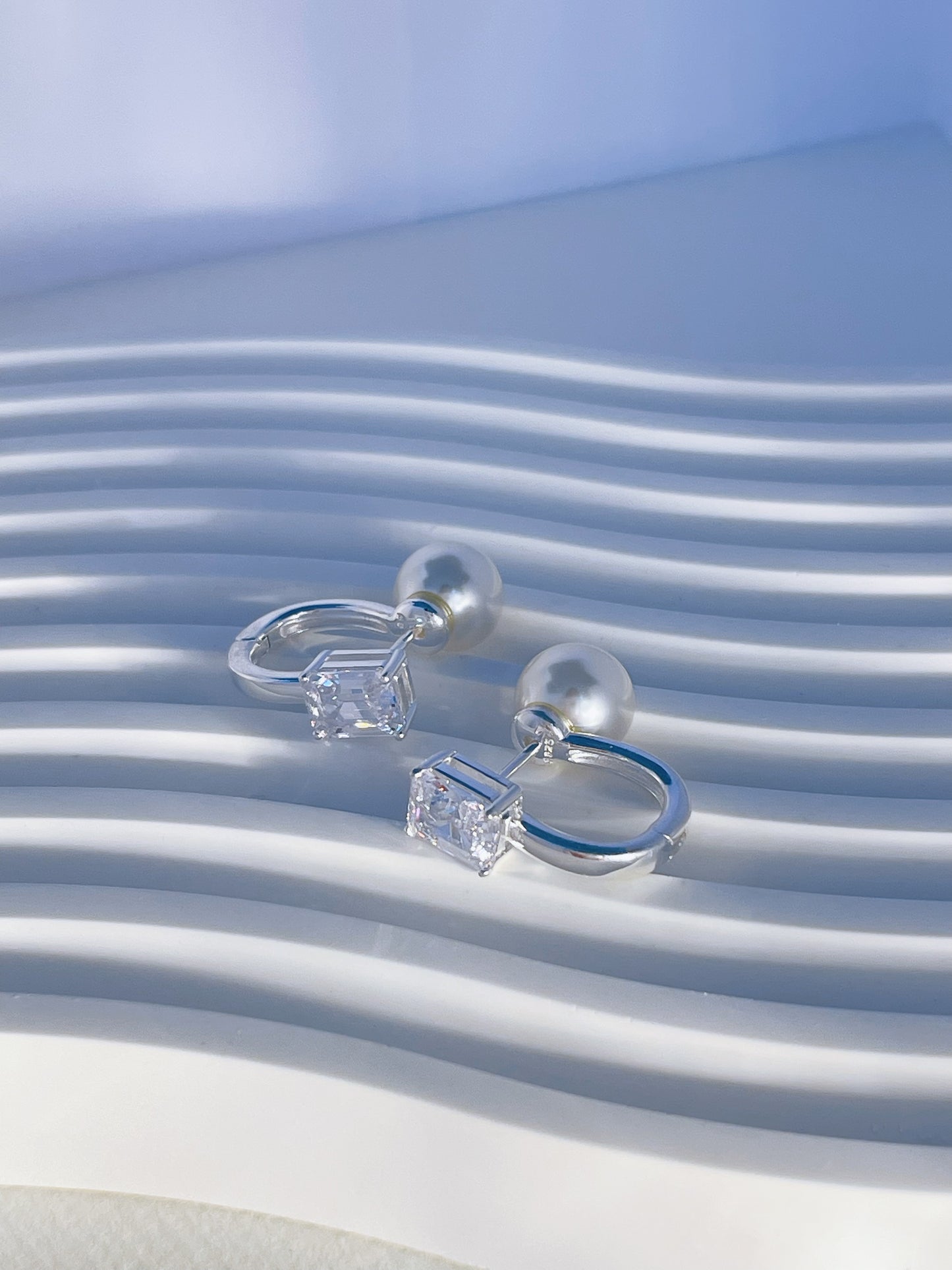 Double-sided earring