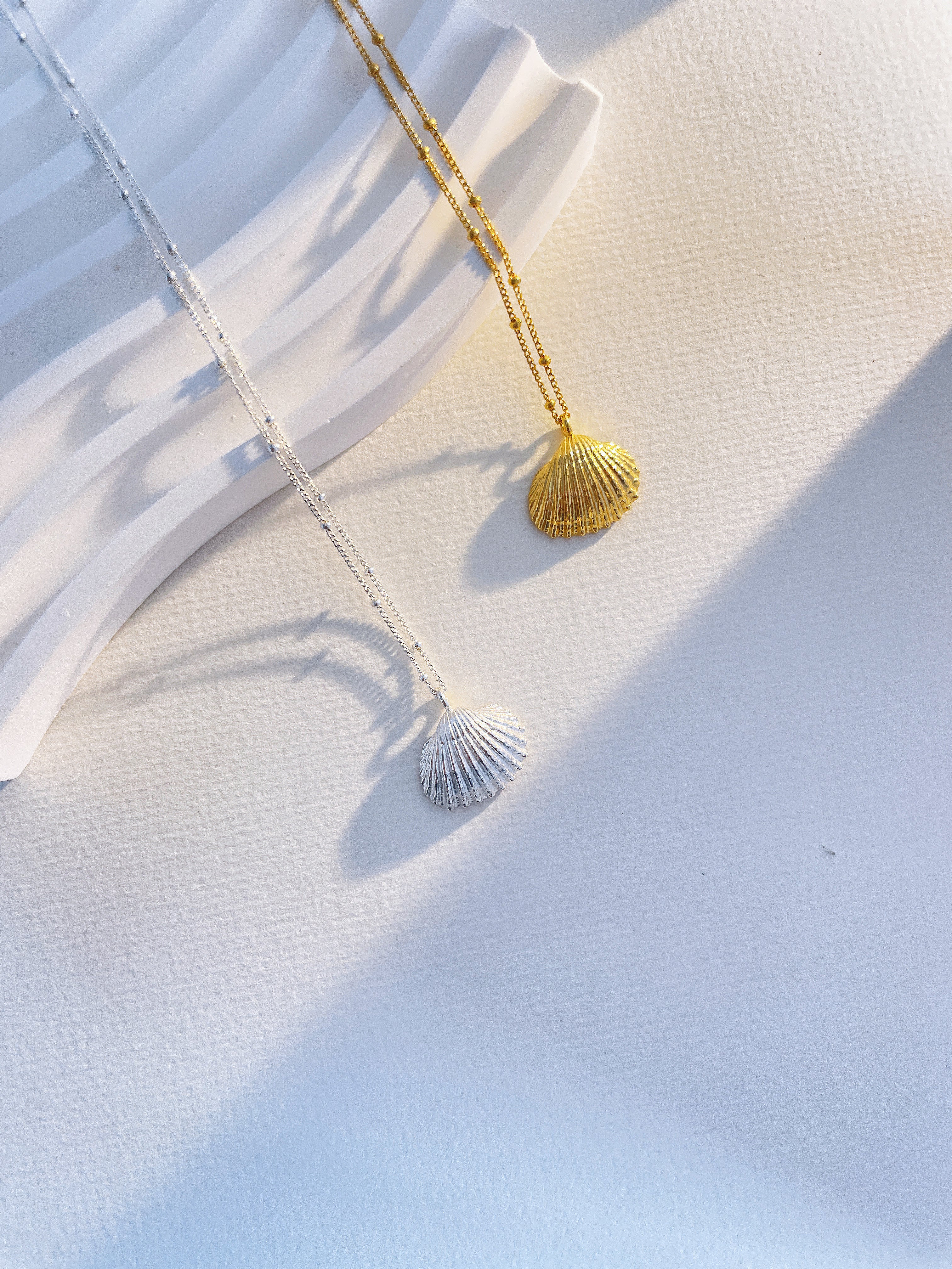 Silver seashell online necklace