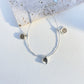Three pendant bracelet