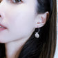 Irregular round piece earrings