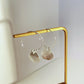 Irregular round piece earrings