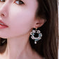 Asymmetrical wreath earrings