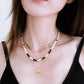 Crescent-shaped pendant necklace