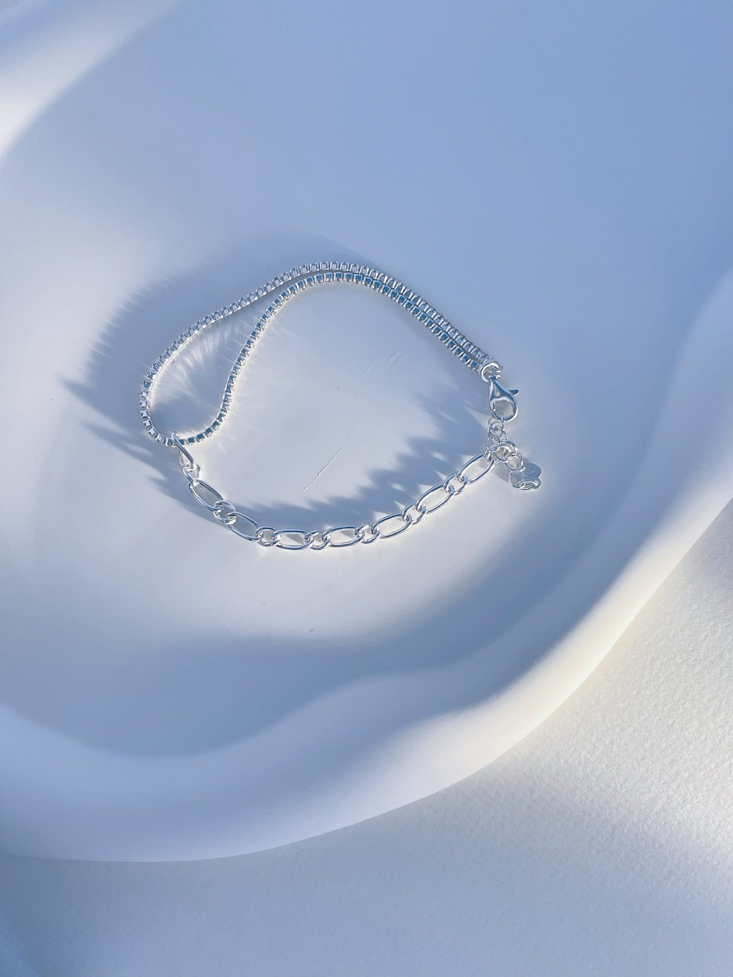 Asymmetric silver bracelet