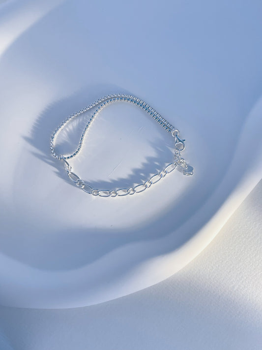 Asymmetric silver bracelet