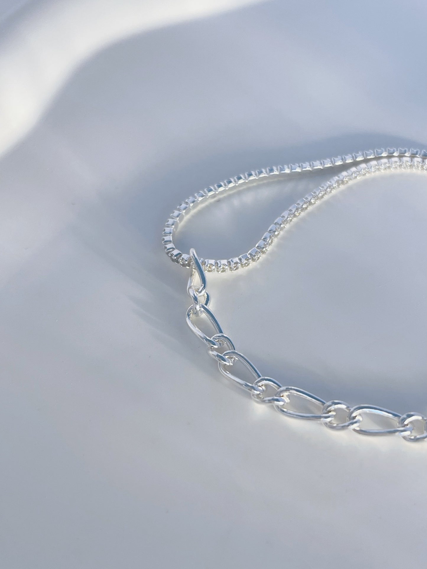 Asymmetric silver bracelet