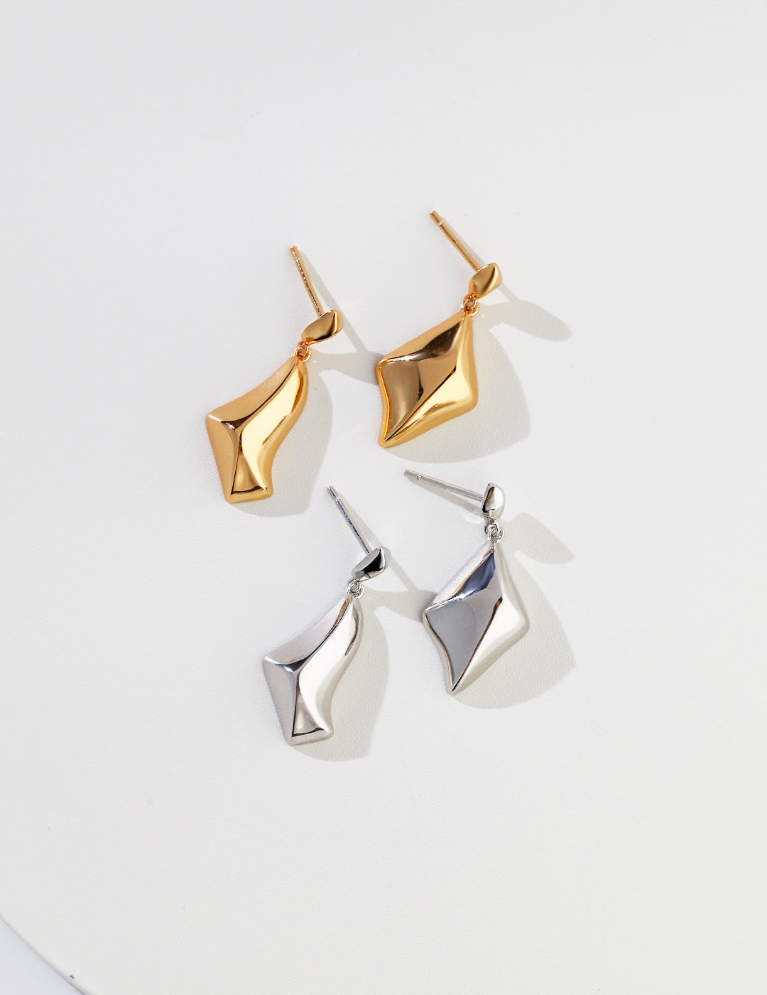 Twisted quadrilateral earrings